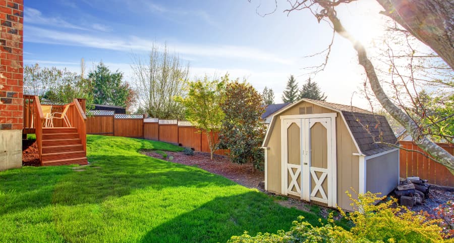 Fenced backyard with storage shed in Napa